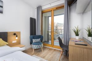 Posteľ alebo postele v izbe v ubytovaní City of the Kings-Silver Apartment No 2- Lubelska 10