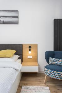 Posteľ alebo postele v izbe v ubytovaní City of the Kings-Silver Apartment No 2- Lubelska 10