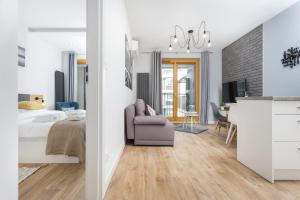 Posteľ alebo postele v izbe v ubytovaní City of the Kings-Silver Apartment No 2- Lubelska 10