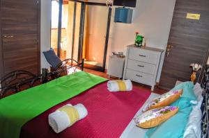 Posteľ alebo postele v izbe v ubytovaní B&B Le Anthos
