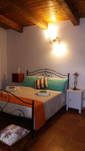 Posteľ alebo postele v izbe v ubytovaní B&B Le Anthos