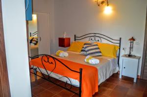 Posteľ alebo postele v izbe v ubytovaní B&B Le Anthos