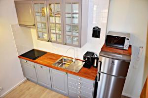 Kuchyňa alebo kuchynka v ubytovaní Relax Loft Apartment