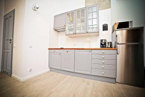 Kuchyňa alebo kuchynka v ubytovaní Relax Loft Apartment