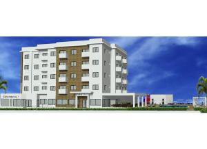 a rendering of a hotel building with palm trees at Livas Hotel Apartments in Protaras