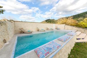 The swimming pool at or close to Villa Tipica Casa Tua
