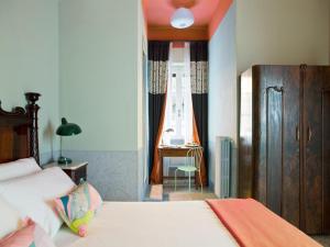 A bed or beds in a room at PratinnVatican