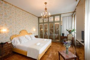 Postel nebo postele na pokoji v ubytování Hotel Continental