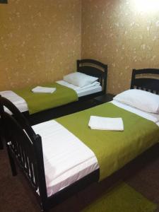 Postel nebo postele na pokoji v ubytování Guest House Pid Dubom