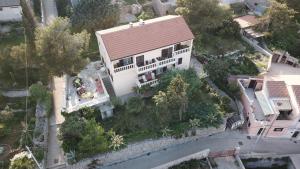 an overhead view of a white house with a yard at Seaview Antonija in Veli Lošinj