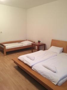Postel nebo postele na pokoji v ubytování Holiday Park Vrchlabí - Liščí farma