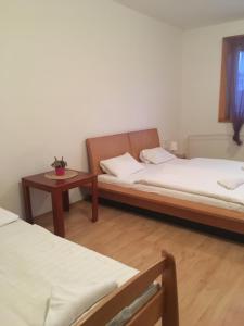Postel nebo postele na pokoji v ubytování Holiday Park Vrchlabí - Liščí farma
