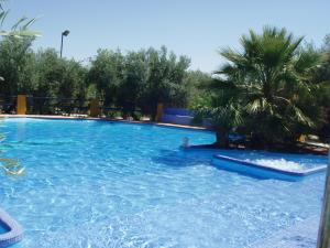Swimmingpoolen hos eller tæt på Cortijo los Llanos