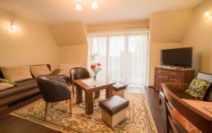 Telewizja i/lub zestaw kina domowego w obiekcie Janówka Apartamenty