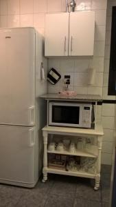 Kuchyň nebo kuchyňský kout v ubytování 3 ambientes en Retiro / Recoleta (Centro)