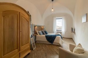 Postel nebo postele na pokoji v ubytování Casa Claudia