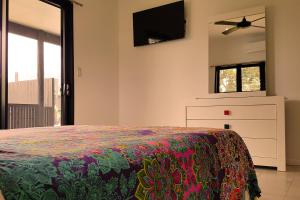 Кровать или кровати в номере Boaza Place