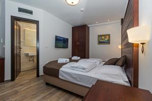Giường trong phòng chung tại Villa Sofija