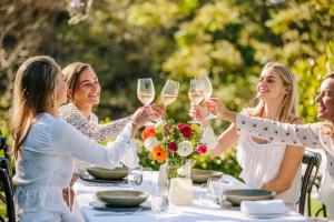 a group of women sitting at a table drinking wine at Spicers Clovelly Estate in Montville