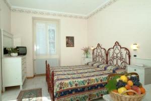 Postel nebo postele na pokoji v ubytování Hotel Brisino