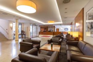 a lobby with couches and a waiting room at Best Western Hotel Bamberg in Bamberg