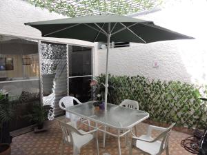 Patio nebo venkovní prostory v ubytování hotel medellin calasanz