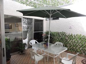 Patio nebo venkovní prostory v ubytování hotel medellin calasanz