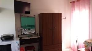 Kuchyň nebo kuchyňský kout v ubytování Eva Apartments + 37 fotografií