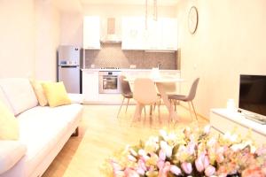 Kuchyň nebo kuchyňský kout v ubytování Super Luxury Apartments
