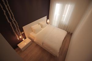 Postel nebo postele na pokoji v ubytování Super Luxury Apartments
