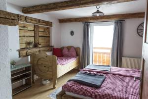 Postel nebo postele na pokoji v ubytování Rauriser Bergchalet