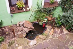 Un jardín fuera de Rodinný hotel Myslivna