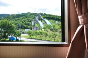 Nespecifikovaný výhled na hory nebo výhled na hory při pohledu z hotelu