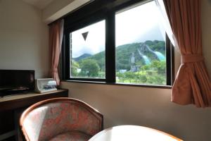 Nespecifikovaný výhled na hory nebo výhled na hory při pohledu z hotelu