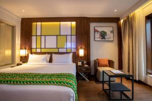 Postel nebo postele na pokoji v ubytování Hotel Span International