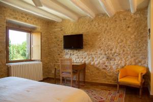 TV a/nebo společenská místnost v ubytování Casa Anamaria Hotel