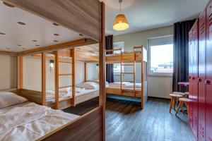 Posteľ alebo postele v izbe v ubytovaní MEININGER Hotel Salzburg City Center