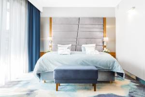 Postel nebo postele na pokoji v ubytování Hotel Testa