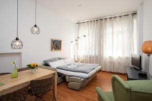 a living room with a couch and a table at Wertschätzer III - Paulinenstr in Detmold