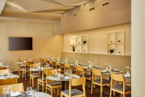 Majoituspaikan H+ Hotel Wien ravintola tai vastaava paikka