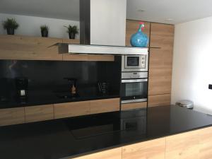 Kuchyňa alebo kuchynka v ubytovaní Residence Muna 3055