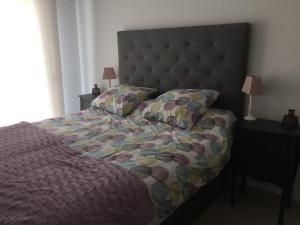 Posteľ alebo postele v izbe v ubytovaní Residence Muna 3055