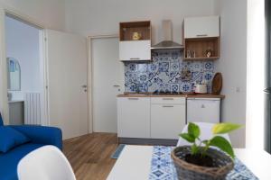 Kuchyňa alebo kuchynka v ubytovaní Baglio Reale Apartments