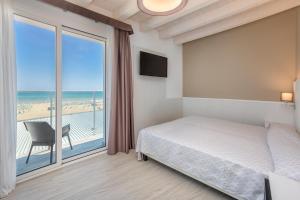 Katil atau katil-katil dalam bilik di Hotel Garni' Serena