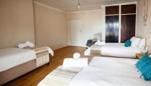Postel nebo postele na pokoji v ubytování Witfontein Game Lodge