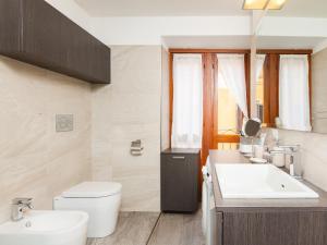 Koupelna v ubytování easyhomes - Spiga Suite