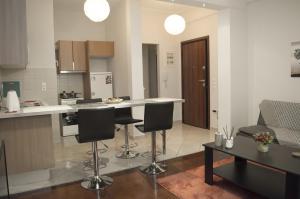 Kuchyň nebo kuchyňský kout v ubytování Modern apartment, EXCELLENT and VIBRANT location!!
