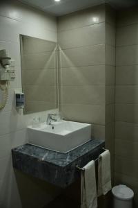 Koupelna v ubytování Hotel Anjos