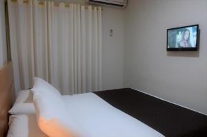Letto o letti in una camera di Classe Apart Hotel