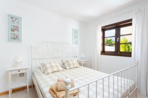 A bed or beds in a room at Luxury Bungalow In Costa Adeje Még 20 kép